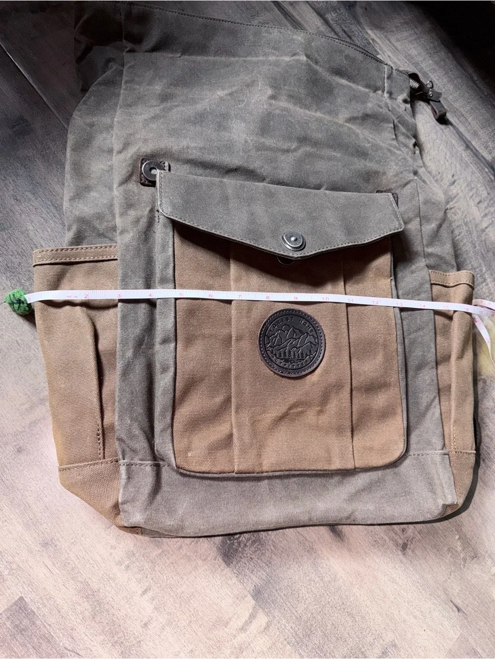 Waxed Canvas Roll-Top Backpack in army green and Brown